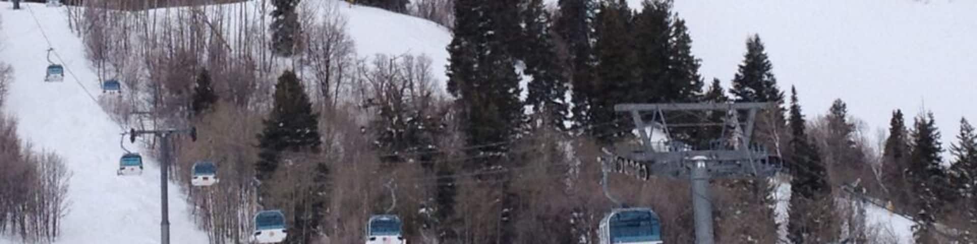 Snow Basin (UT) has 9500' of vertical, and a bunch of great skiing. The ownership group is the same as Sun Valley , and it shows. The lodges are beautiful, the food is good, and the people are very friendly. Park City, Powder Mtn, and Alta are all nearby.