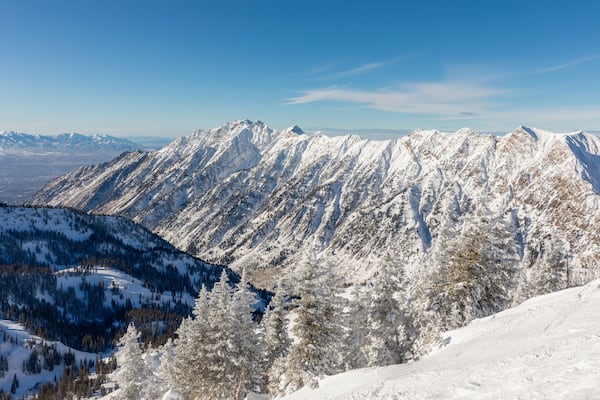 Mountains and skyline viewed from Hidden Peak at Snowbird in Little Cottonwood Canyon in the Wasatch Range near Salt Lake City, Utah, USA.