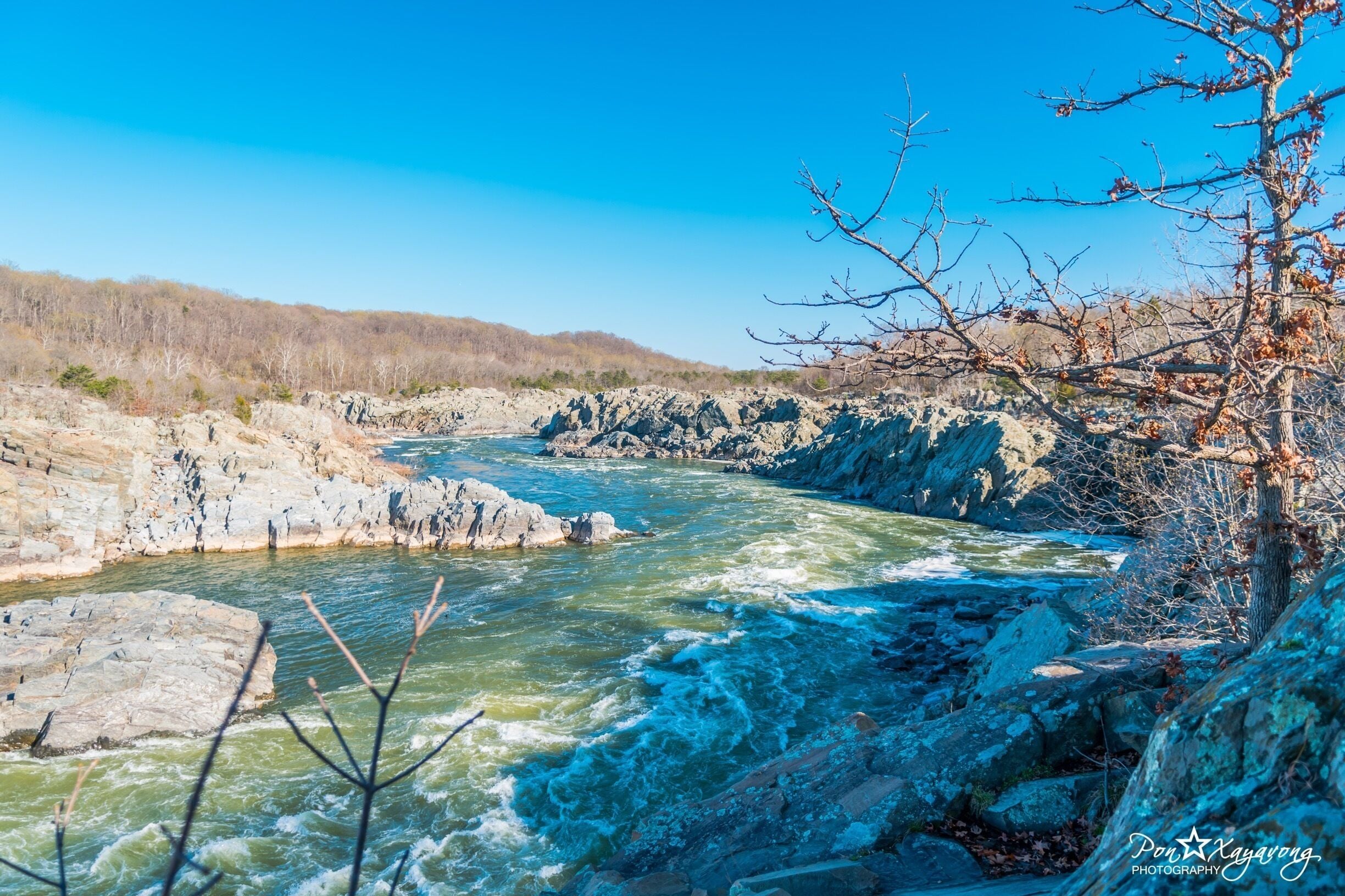 At Great Falls, the Potomac River builds up speed and force as it falls over a series of steep, jagged rocks and flows through the narrow Mather Gorge. The Patowmack Canal offers a glimpse into the early history of this country. Great Falls Park has many opportunities to explore history and nature, all in a beautiful 800-acre park only 15 miles from the Nation's Capital.