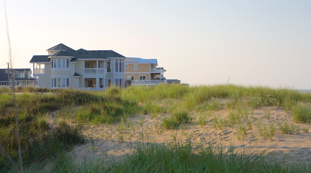 Sandbridge Beach which includes a house, a sandy beach and general coastal views