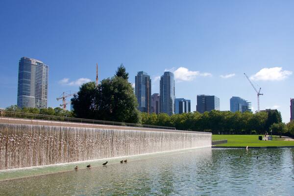 Downtown Park which includes a park and a pond