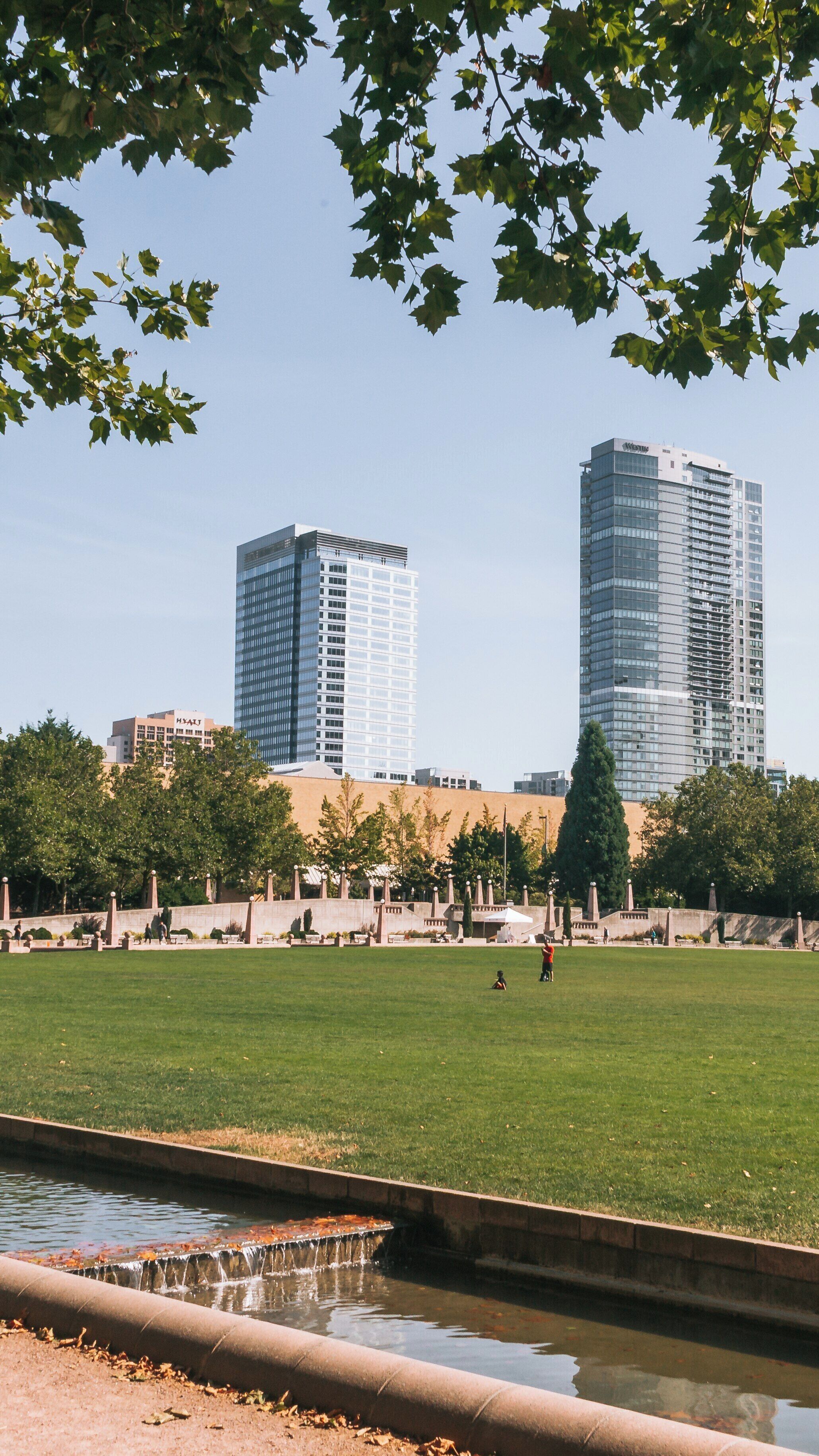 Exploring Downtown Park in West Bellevue, Washington on a Sunny Day with Scenic Views of Tall Buildings