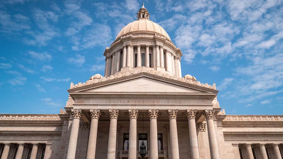 A neoclassical building with a large dome and columns, labeled "LEGISLATIVE BUILDING".