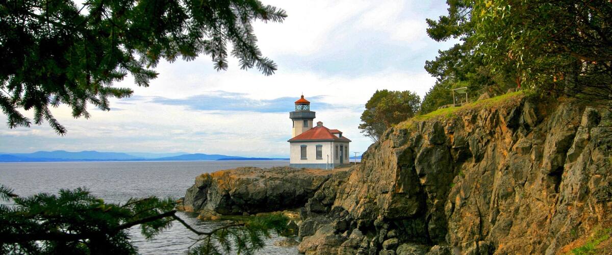 While driving around San Juan Island in Washington, Lynn and I stopped in Lime Kiln State Park. The park is known for the viewing of Orca Whales from the coast, however, our visit was out of Orca season. We walked the trails and unexpectedly came across the lighthouse. This island was a wonderful day trip from Orcas Island where we had been staying for the week.
