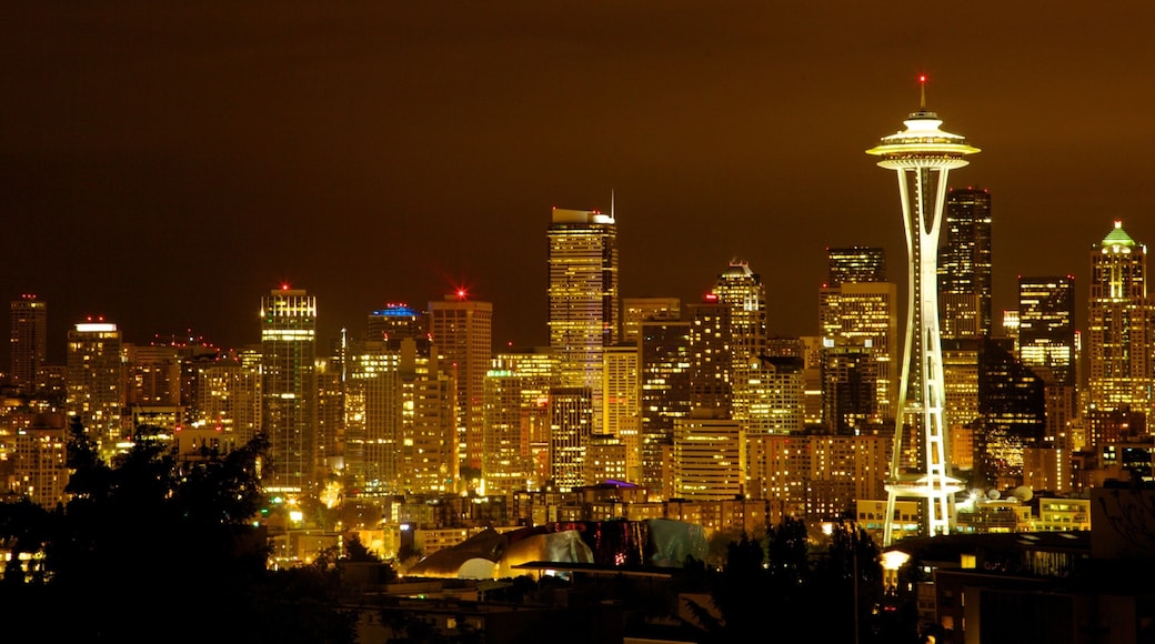 City skyline illuminated at night from Kerry Park in Seattle with sparkling lights and the iconic Space Needle