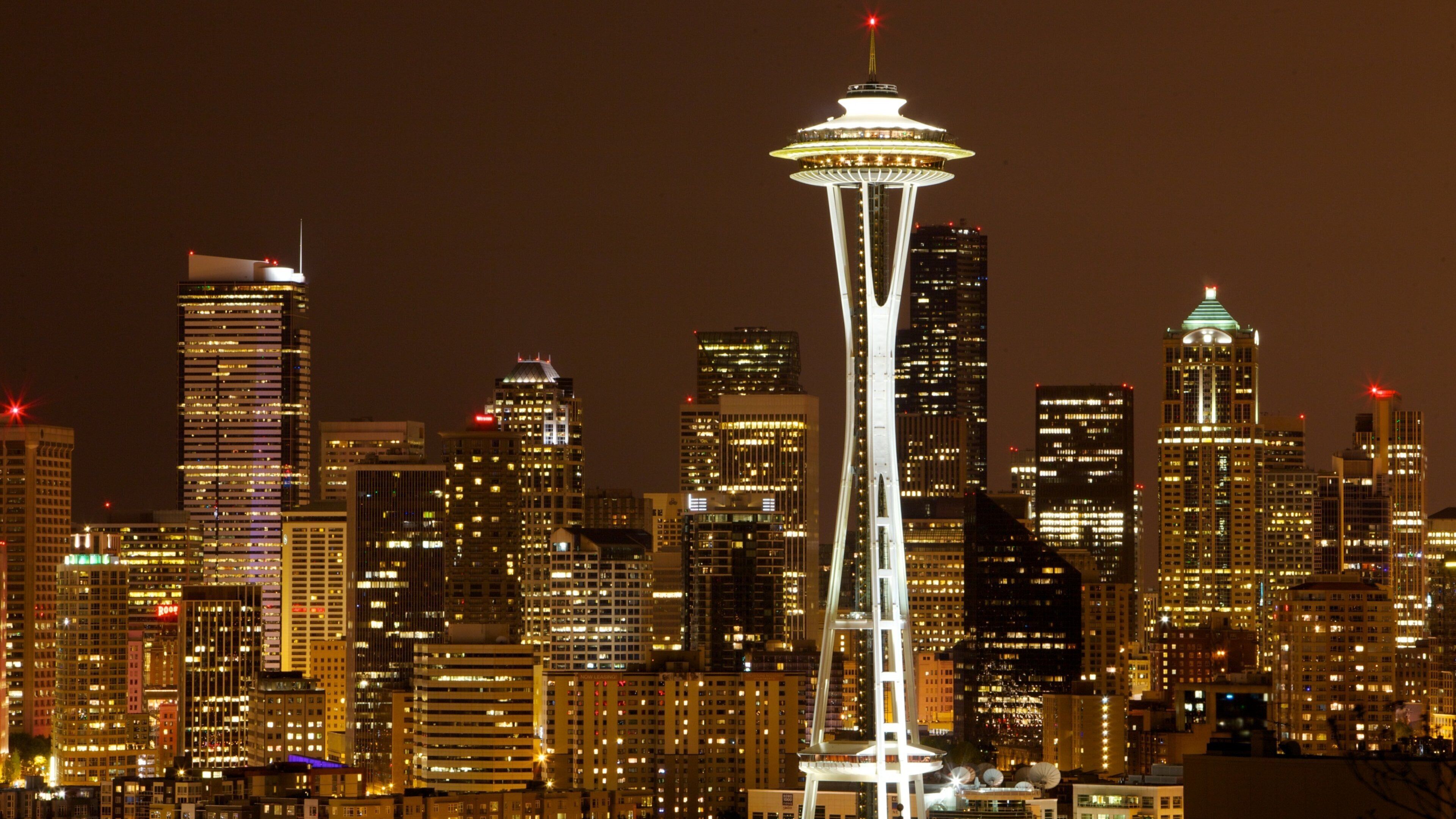 Stunning view of Seattle skyline illuminated at night with the Space Needle standing tall