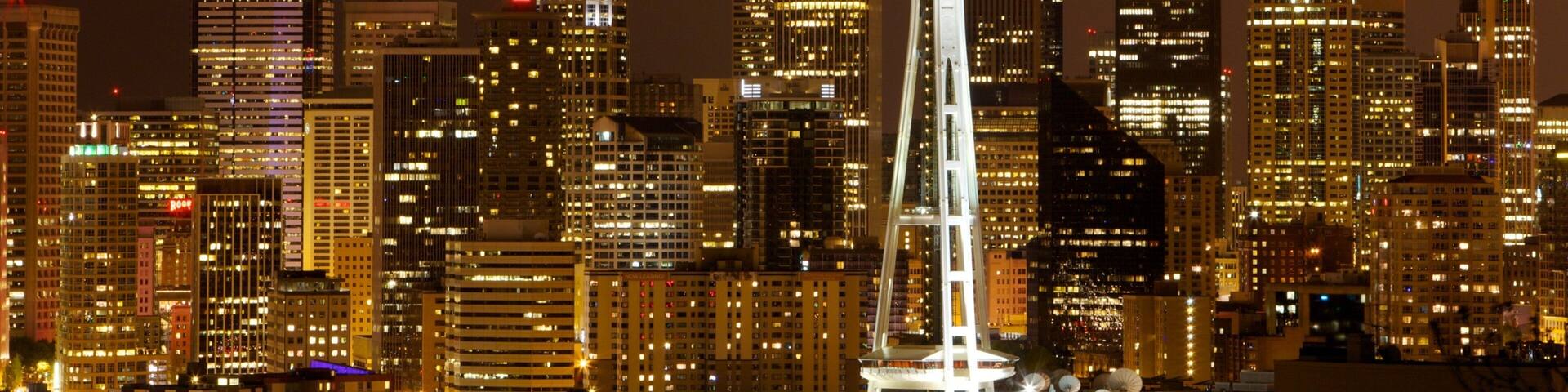 Stunning view of Seattle skyline illuminated at night with the Space Needle standing tall