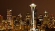 Stunning view of Seattle skyline illuminated at night with the Space Needle standing tall