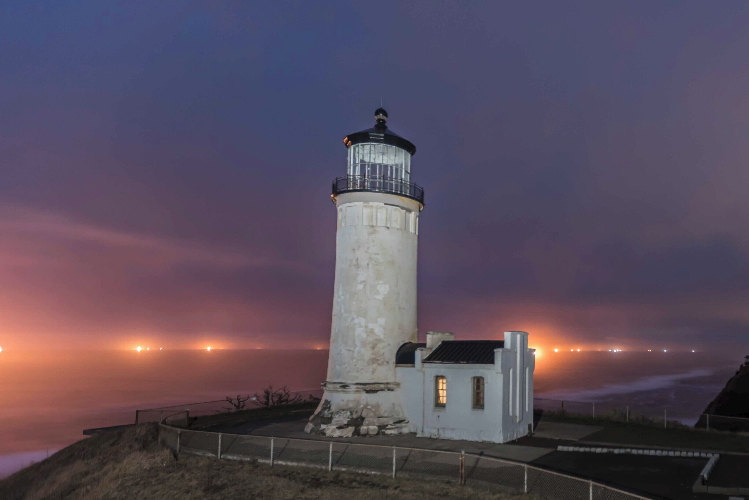 North Head Light House with night trawlers in the back ground.