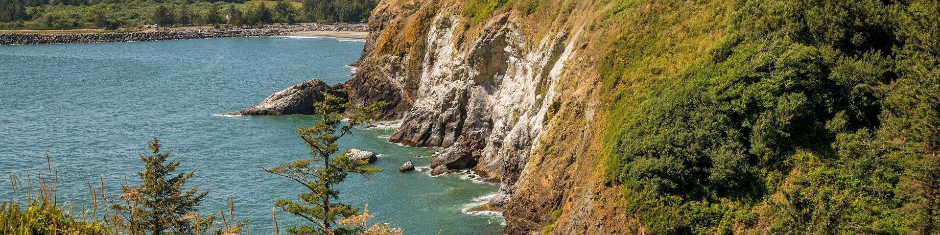 Lewis and Clark Interpretive Center which includes rocky coastline and general coastal views