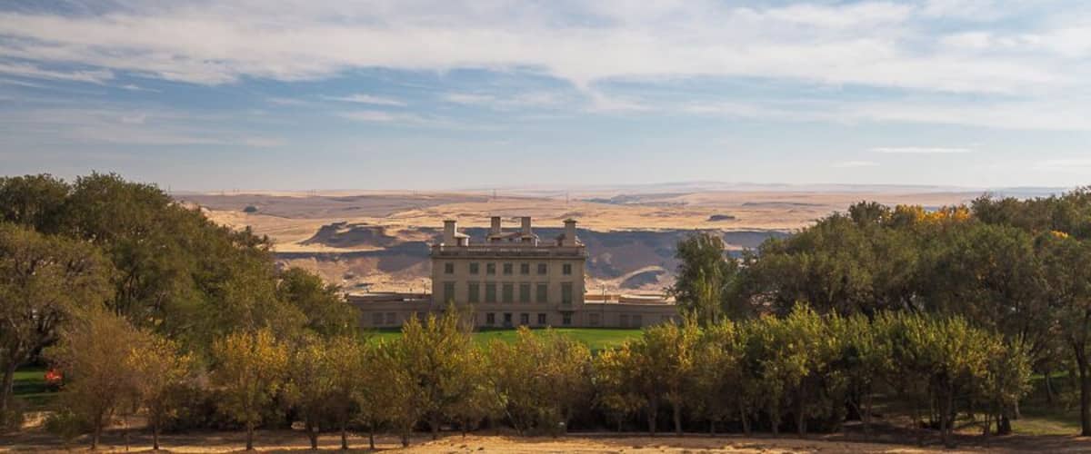 In 1907, Samuel Hill purchased 5,300 acres of land along the Columbia River with the dream of establishing a Quaker farming community. He formed the Maryhill Land Company, named after his daughter, and set about building a town. The village included a store and post office, a Quaker church, an inn, a blacksmithâs shop and a stable.
In 1914, work began on a hilltop mansion that was to be Hillâs home. But the remote location of Maryhill and the lack of irrigation proved insurmountable obstacles and the land company failed. Construction of Hillâs mansion stopped in 1917.
LoĂŻe Fuller
It was then that a friend of HillâsâLoĂŻe Fuller, a pioneer of modern dance living in Parisâconvinced him to turn his would-be mansion into a museum of art. Fullerâs close association with well known artists in France, helped build the core of the museumâs collection, including the acquisition of more than 80 works by French sculptor Auguste Rodin. Hill also transferred his own art collections to the museum.