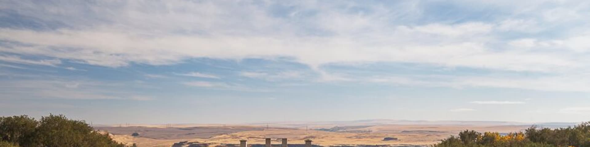 In 1907, Samuel Hill purchased 5,300 acres of land along the Columbia River with the dream of establishing a Quaker farming community. He formed the Maryhill Land Company, named after his daughter, and set about building a town. The village included a store and post office, a Quaker church, an inn, a blacksmith’s shop and a stable.
In 1914, work began on a hilltop mansion that was to be Hill’s home. But the remote location of Maryhill and the lack of irrigation proved insurmountable obstacles and the land company failed. Construction of Hill’s mansion stopped in 1917.
Loïe Fuller
It was then that a friend of Hill’s—Loïe Fuller, a pioneer of modern dance living in Paris—convinced him to turn his would-be mansion into a museum of art. Fuller’s close association with well known artists in France, helped build the core of the museum’s collection, including the acquisition of more than 80 works by French sculptor Auguste Rodin. Hill also transferred his own art collections to the museum.