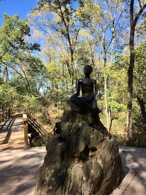 Statue of a young George Washington Carver located on the property he was born into slavery on. He would leave here in 1875 at age 11 to attend a 'colored' school. His thirst for education would continue throughout his life leading him to a teaching job at the Tuskegee institute. It's an inspirational story that is well documented and explained at this National Monument.