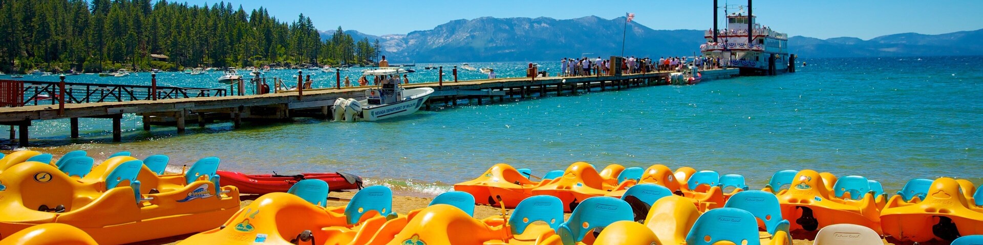 Zephyr Cove Beach showing a bay or harbor, a sandy beach and a marina
