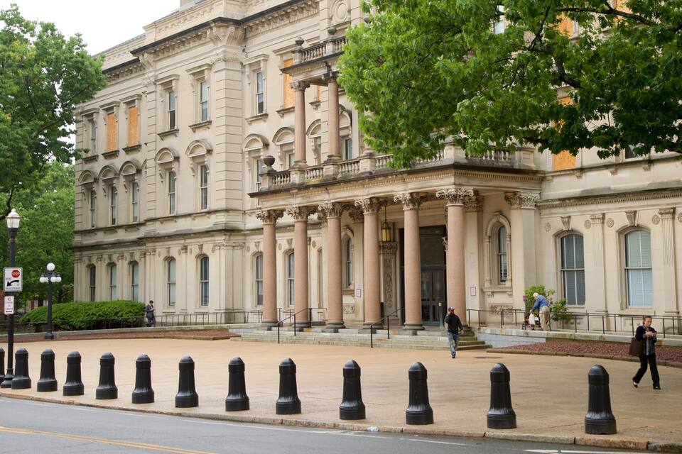 A historic building with classical architecture, including columns and ornate details.