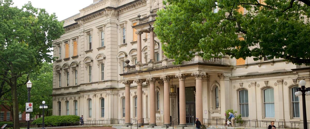 A historic building with classical architecture, including columns and ornate details.