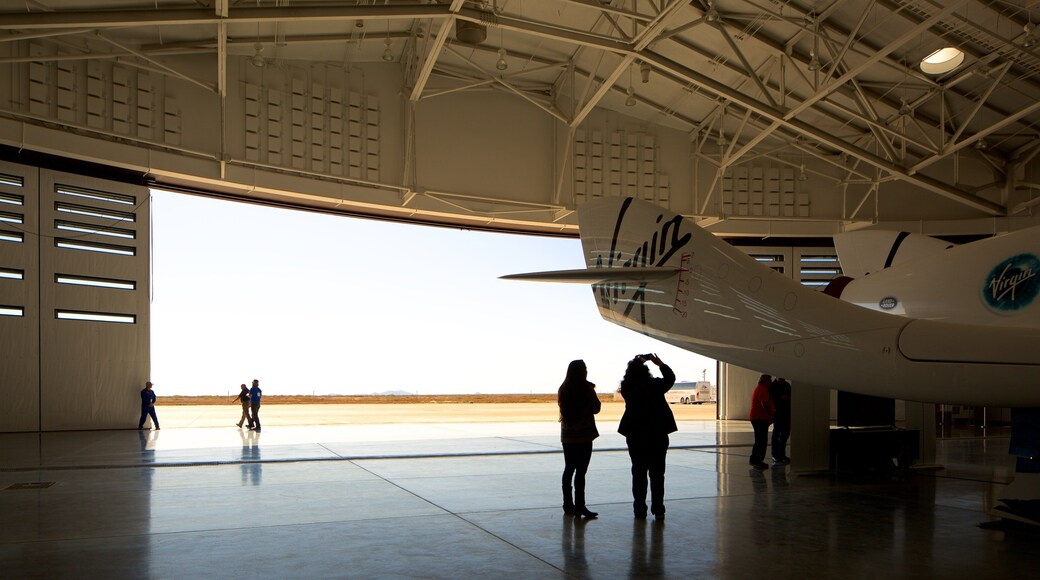 Spaceport America showing interior views, aircraft and industrial elements