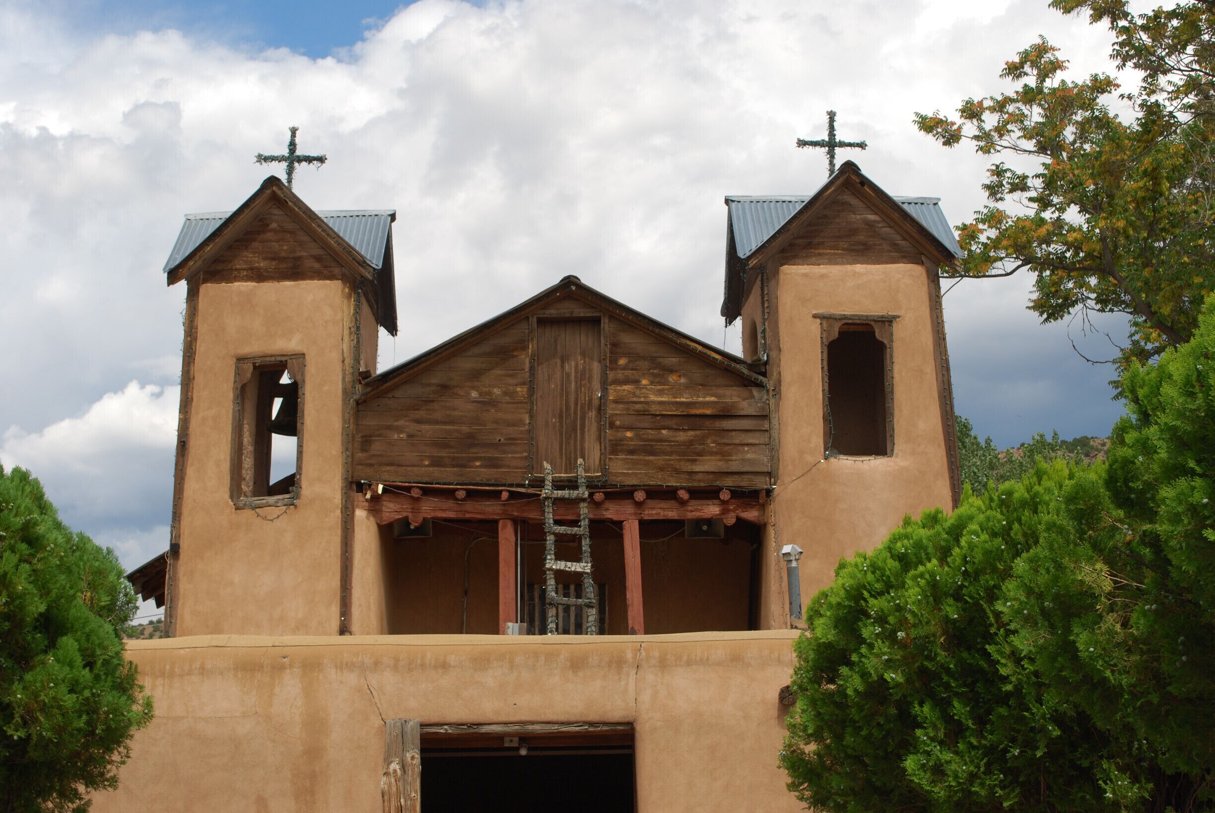 Very interesting place indeed. It has a peaceful yet majestic feel with beautiful desert valley views.
 El Santuario de Chimayo, the tiny shrine that is built on the site of what many believe to be a miracle associated with the crucifix of "Nuestro Señor de Esquipulas" 
Many visitors to the church take a small amount of the "holy dirt", often in hopes of a miraculous cure for themselves or someone who could not make the trip. Formerly, at least, they often ate the dirt.[6] (Likewise pilgrims to the original shrine of Esquipulas eat the supposedly curative clay found there.)[8] Now seekers of cures more commonly rub themselves with the dirt or simply keep it. The Church replaces the dirt in the pocito from the nearby hillsides,[12] sometimes more than once a day, for a total of about 25 or 30 tons a year.
#trovertips #church #historical #faith  