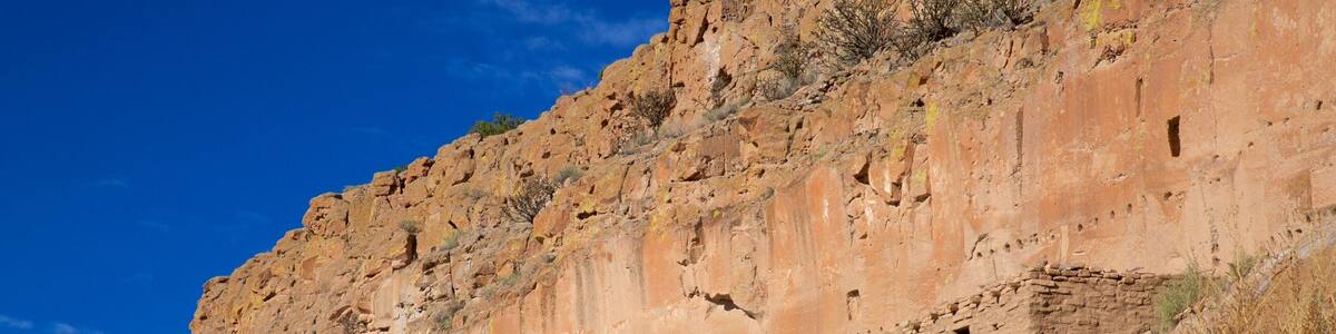 Puye Cliff Dwellings featuring a ruin and tranquil scenes