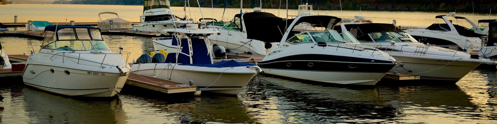Mid-Hudson Bridge which includes a sunset, a river or creek and a bay or harbor