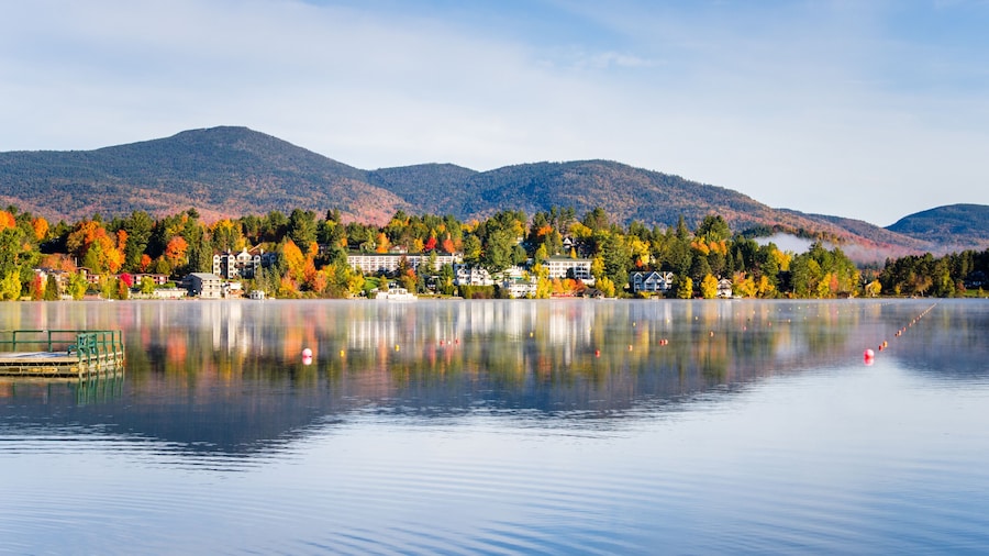 Beautiful Village of Lake Placid from a Foggy Mirror Lake in Autumn at Sunrise