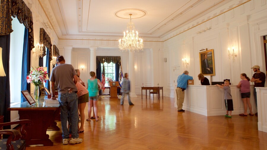 West Virginia State Capitol Building featuring interior views and an administrative buidling as well as a small group of people