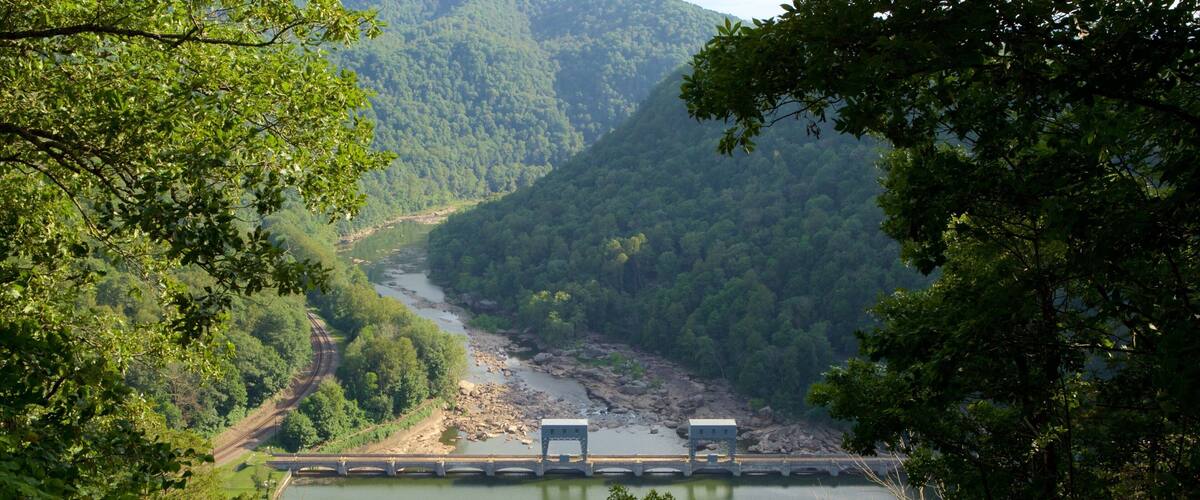 Hawks Nest State Park showing tranquil scenes, railway items and a river or creek