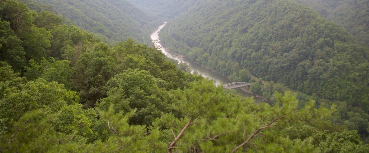 New River Gorge Bridge featuring a gorge or canyon, landscape views and a river or creek