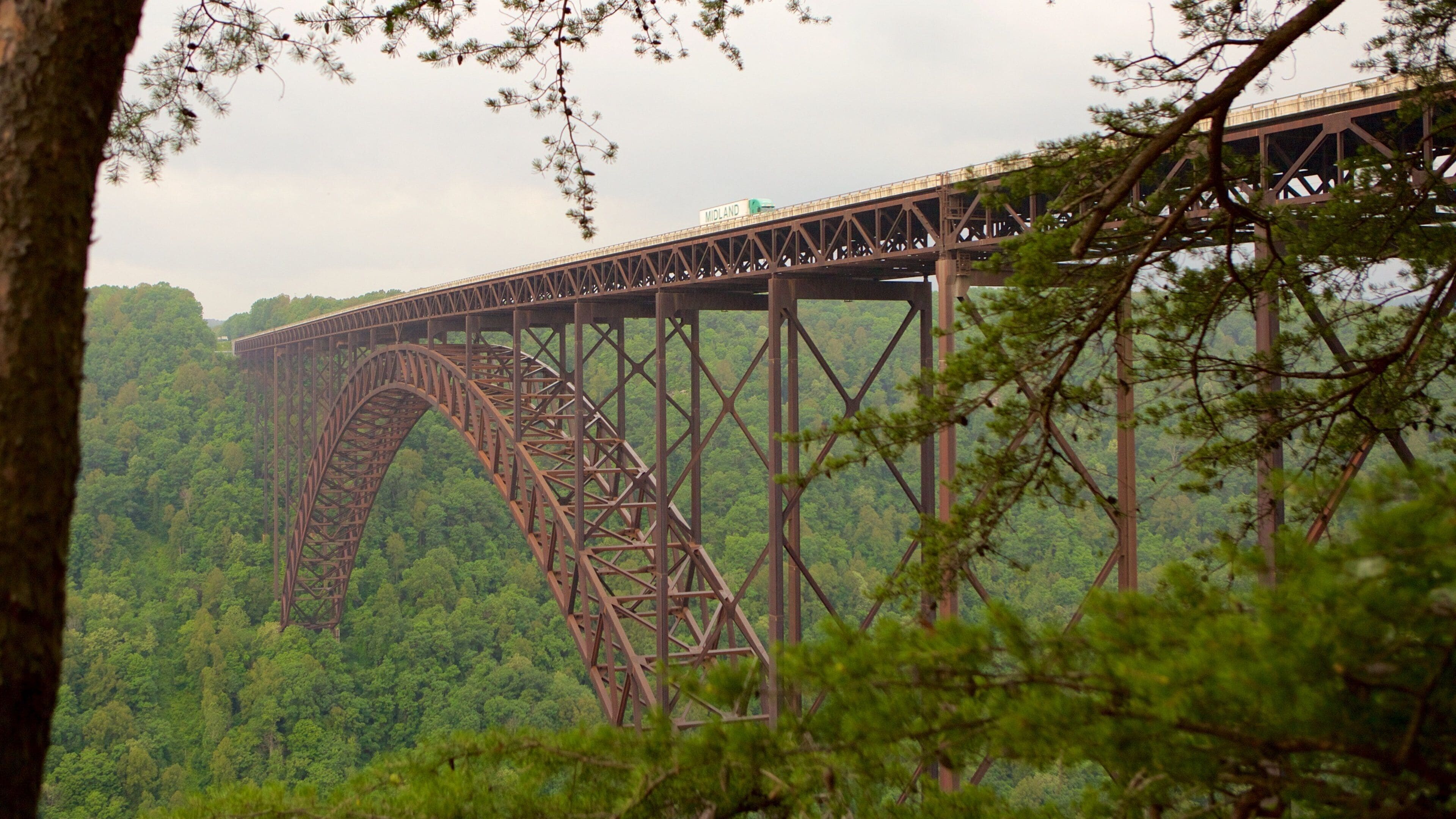 New River Gorge Bridge featuring a gorge or canyon, tranquil scenes and a bridge