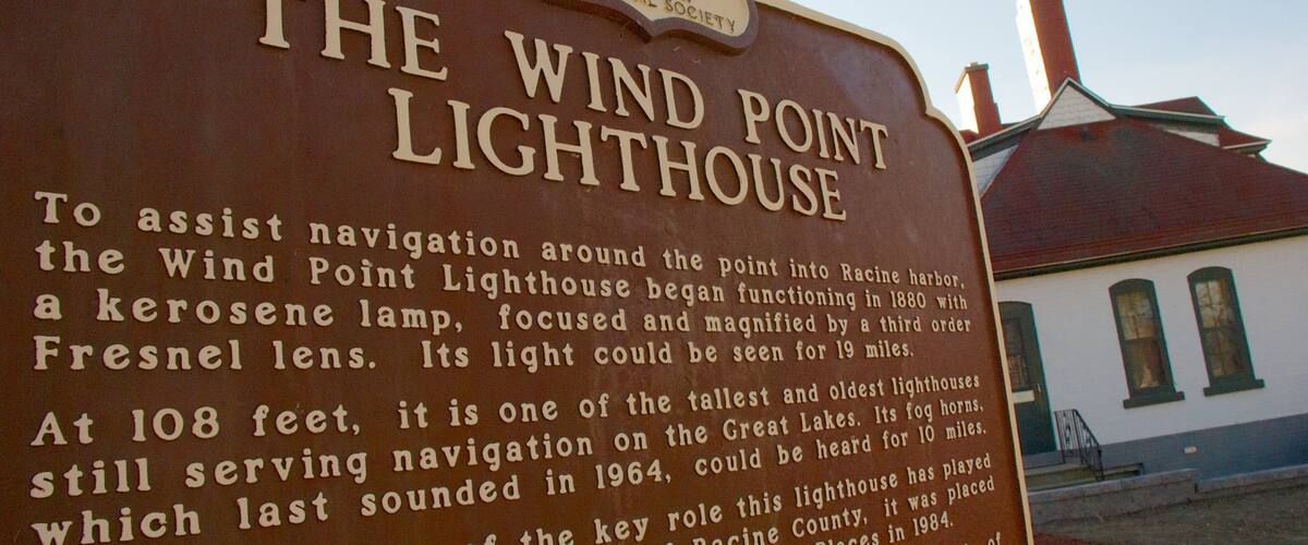 Wind Point Lighthouse which includes signage and a lighthouse