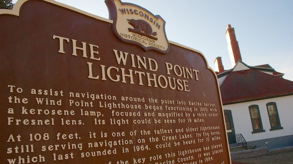 A sign for the Wind Point Lighthouse, detailing its history and features.