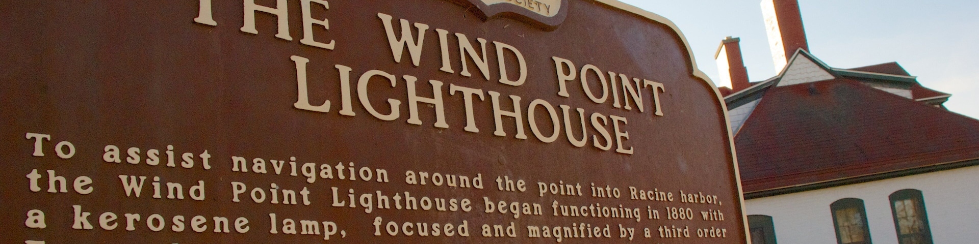 Wind Point Lighthouse which includes signage and a lighthouse