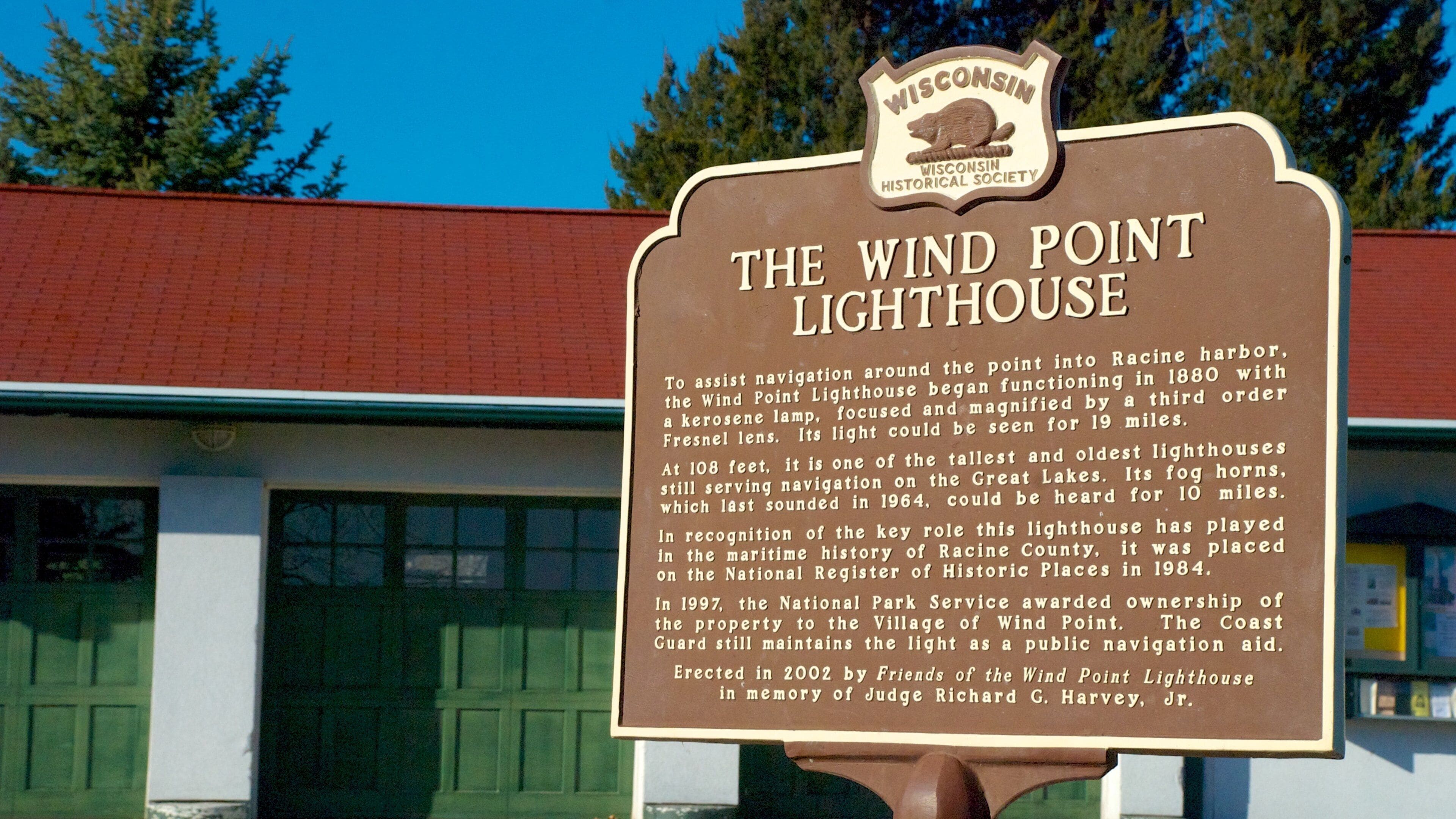 Wind Point Lighthouse showing a lighthouse, heritage architecture and signage