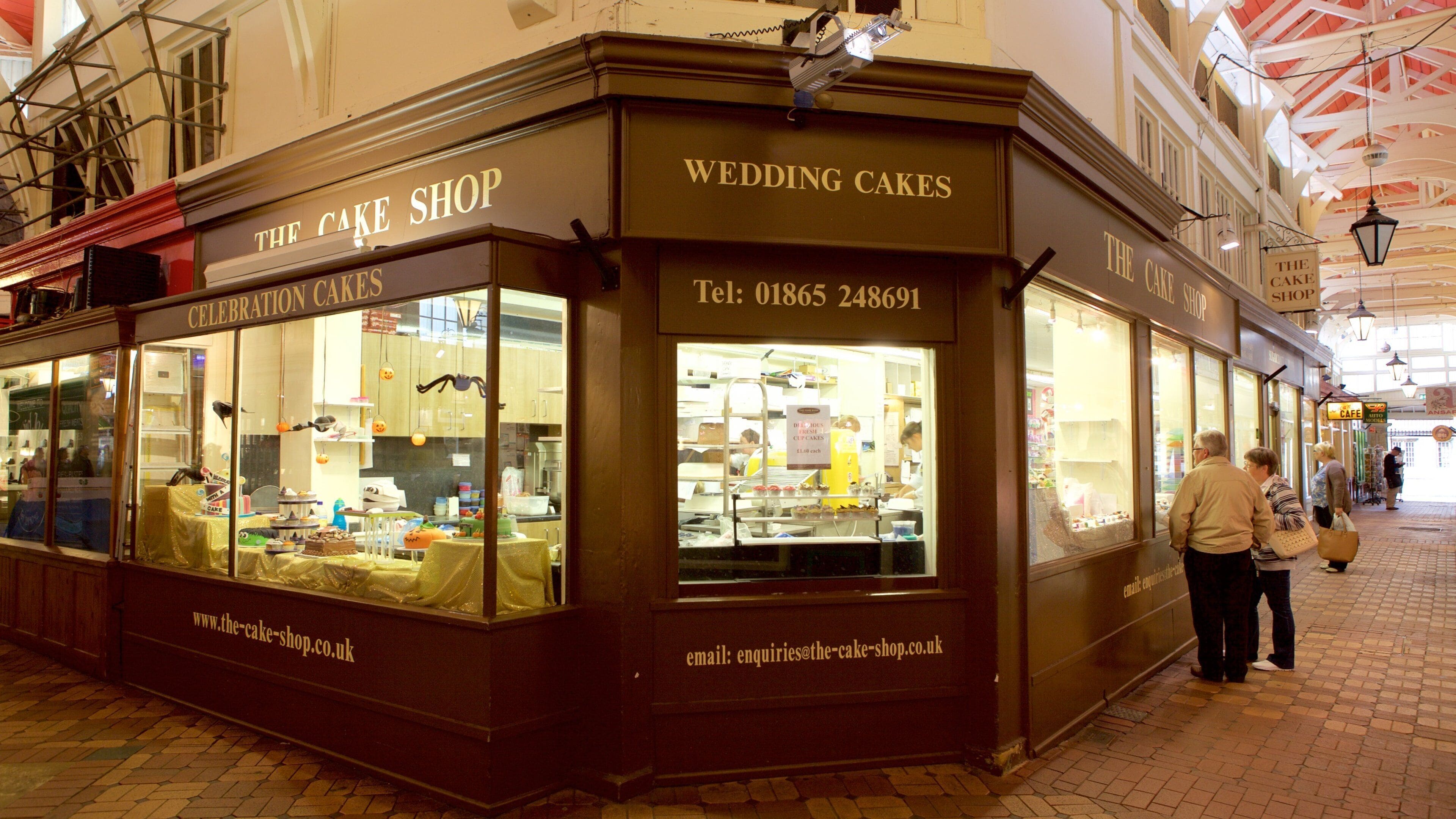 Covered Market que incluye mercados, comida y compras