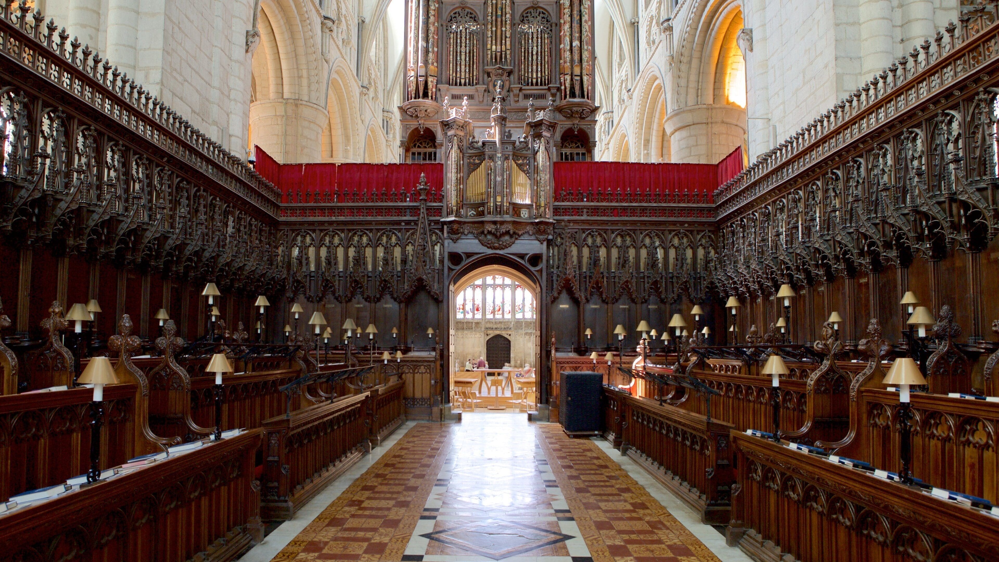 Gloucester Cathedral featuring a church or cathedral, religious elements and interior views