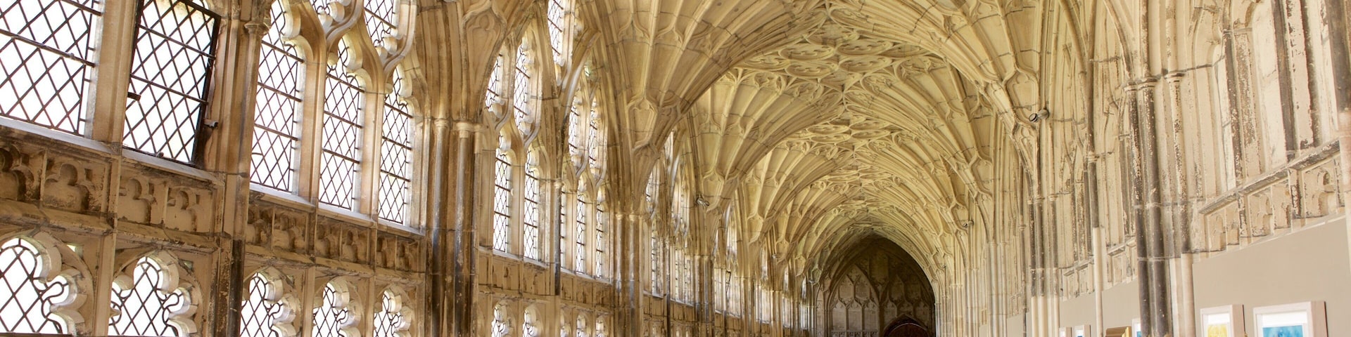 Gloucester Cathedral which includes heritage architecture, interior views and a church or cathedral