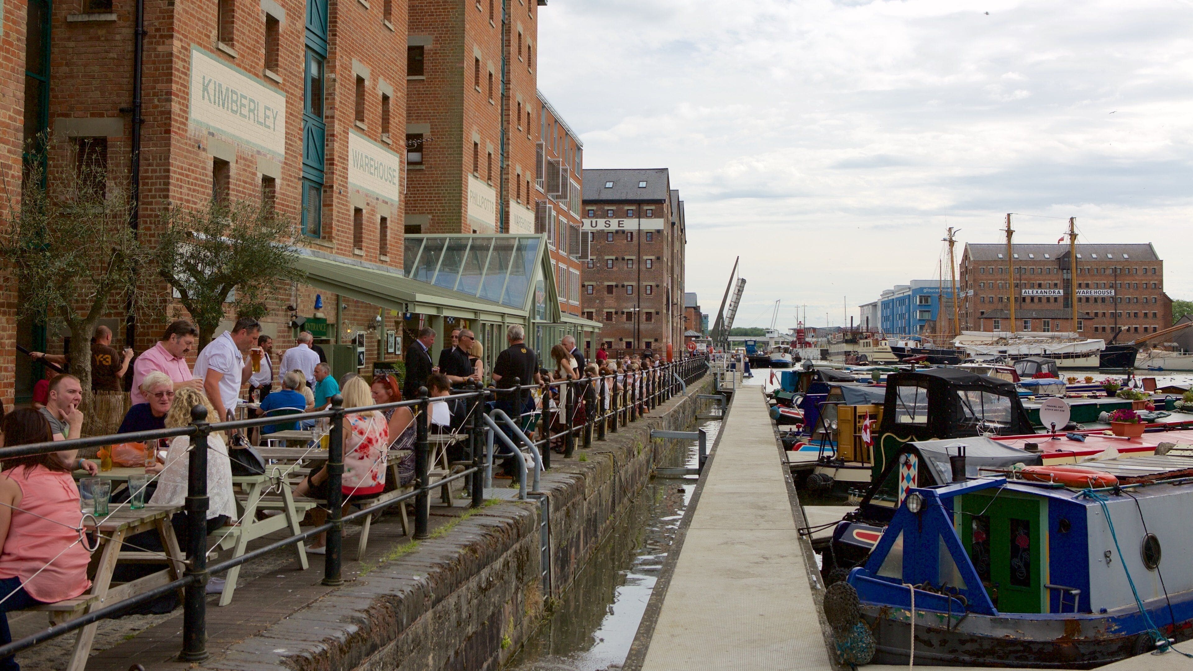 Merchants\' Quay which includes outdoor eating, industrial elements and a marina