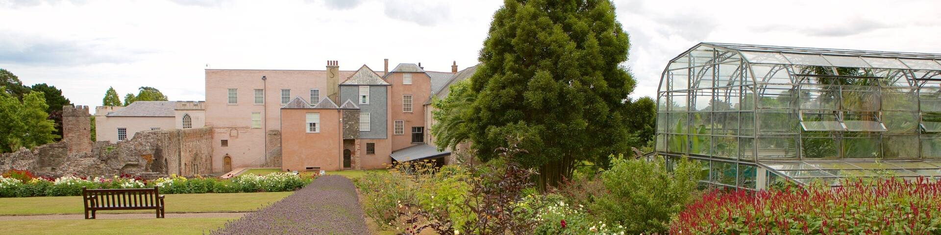 Torre Abbey which includes heritage architecture, a garden and flowers