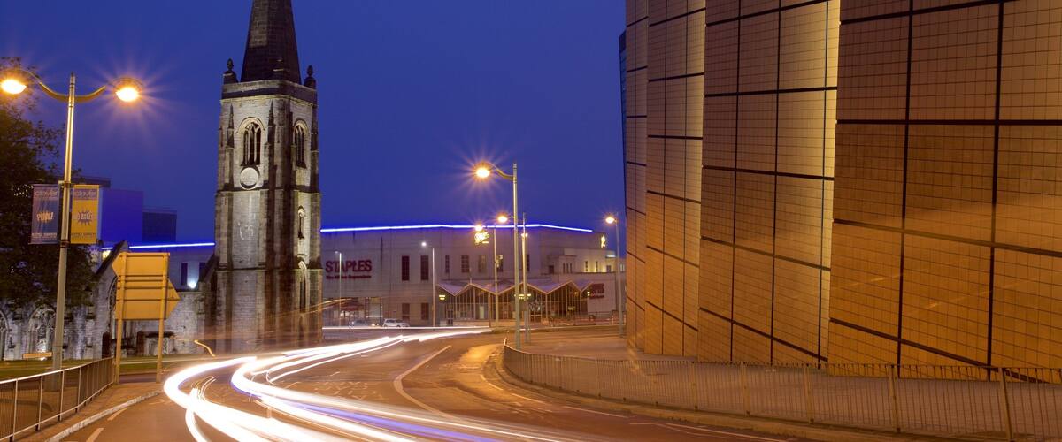 Charles Church showing night scenes, a church or cathedral and heritage elements