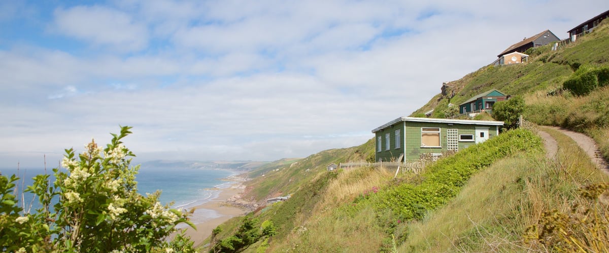 Whitsand Bay Beach featuring a sandy beach and a coastal town