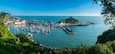 Ilfracombe Harbor at sunrise in broad panorama across the picturesque town., Shutterstock ID 690936316, SF SSA Case with Manager Approval: Case 07151371, Job: Prepay credit, Client/Licensee: , Other: