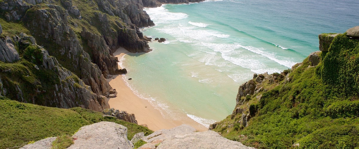 Logan\'s Rock featuring landscape views and a sandy beach