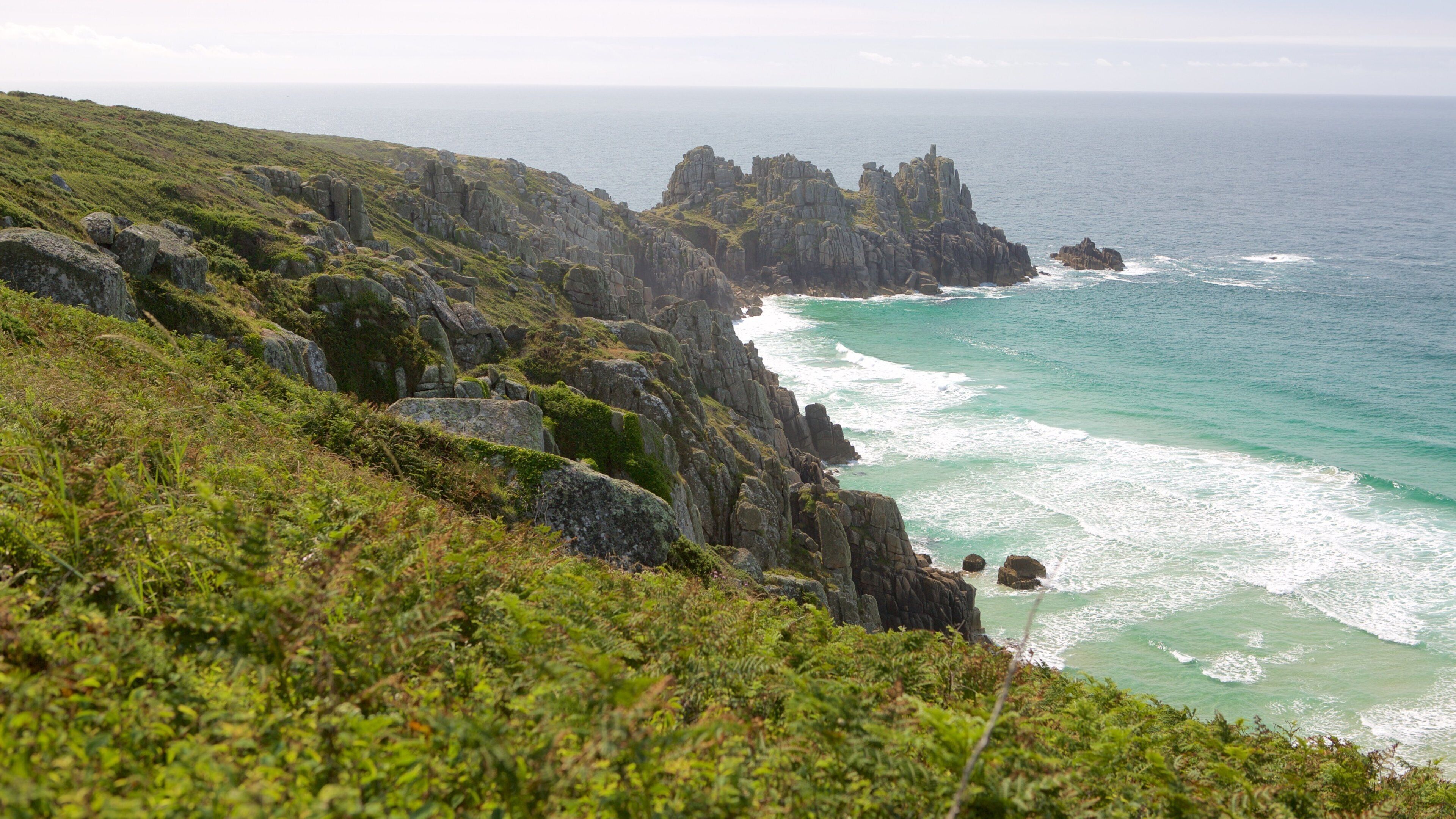 Logan\'s Rock featuring general coastal views, rocky coastline and landscape views