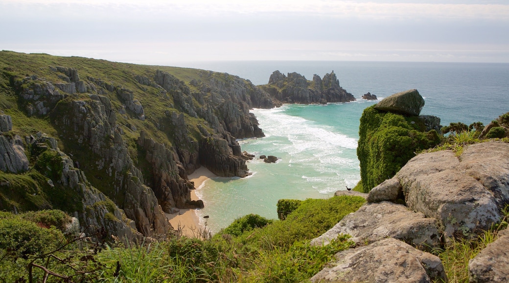 Logan\'s Rock which includes a sandy beach and landscape views