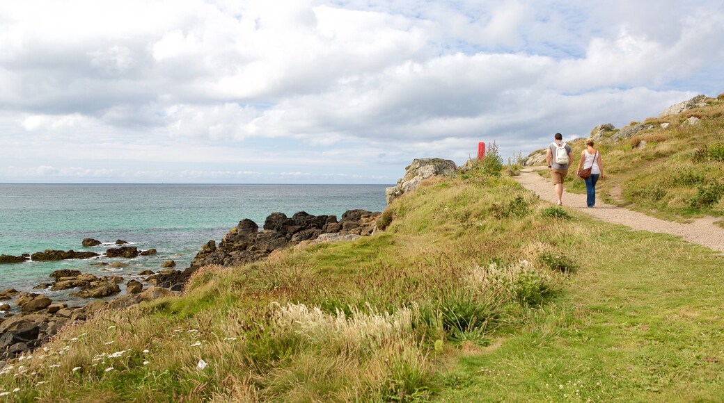 Porthmeor Beach featuring rocky coastline
