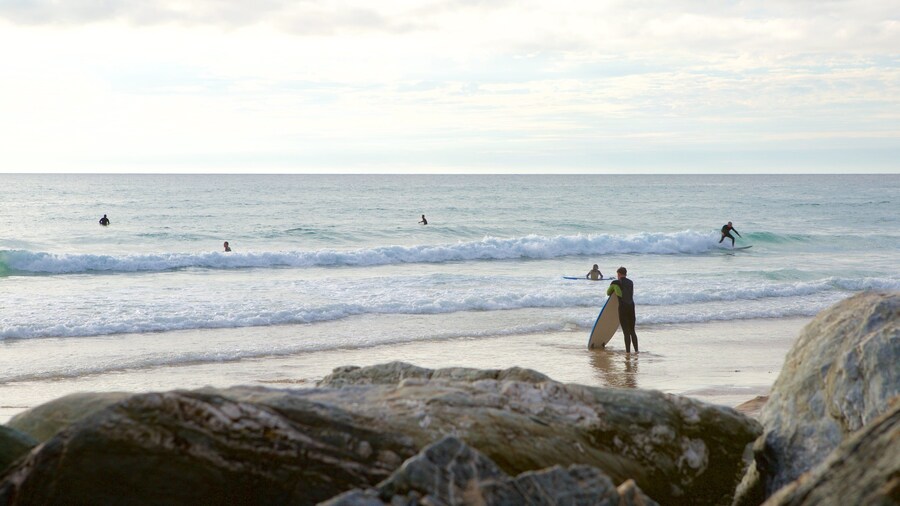 Watergate Bay which includes surfing and surf