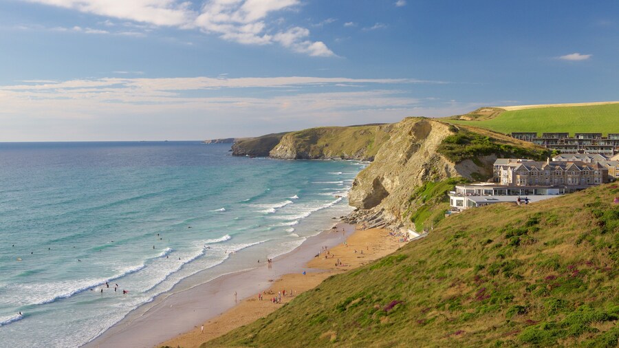 Watergate Bay featuring rugged coastline, a house and a sandy beach