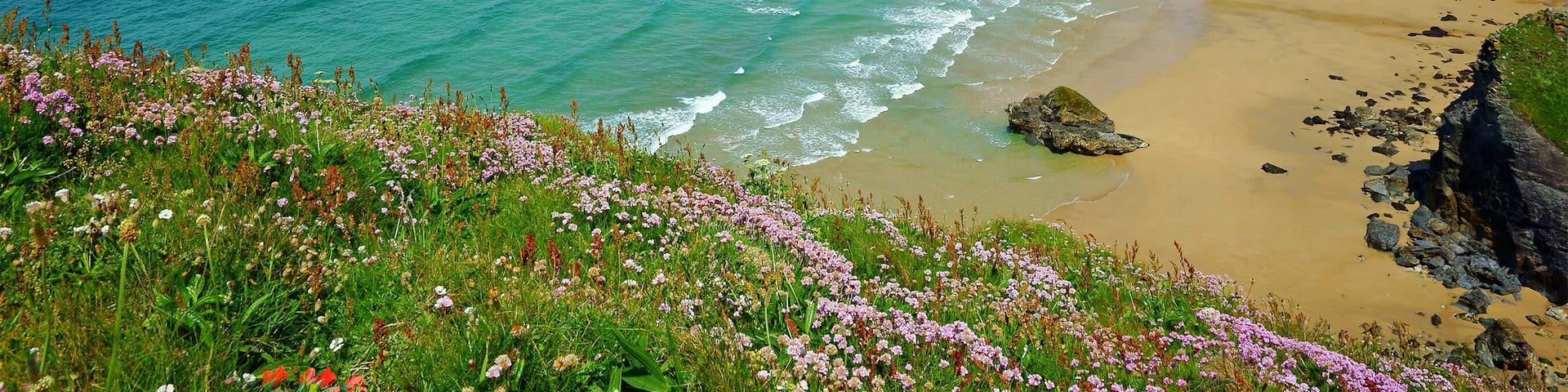 Panorama view of the stunning North Cornish coastline of Bedruthan Steps on a beautiful spring day, Cornwall, England, United Kingdom