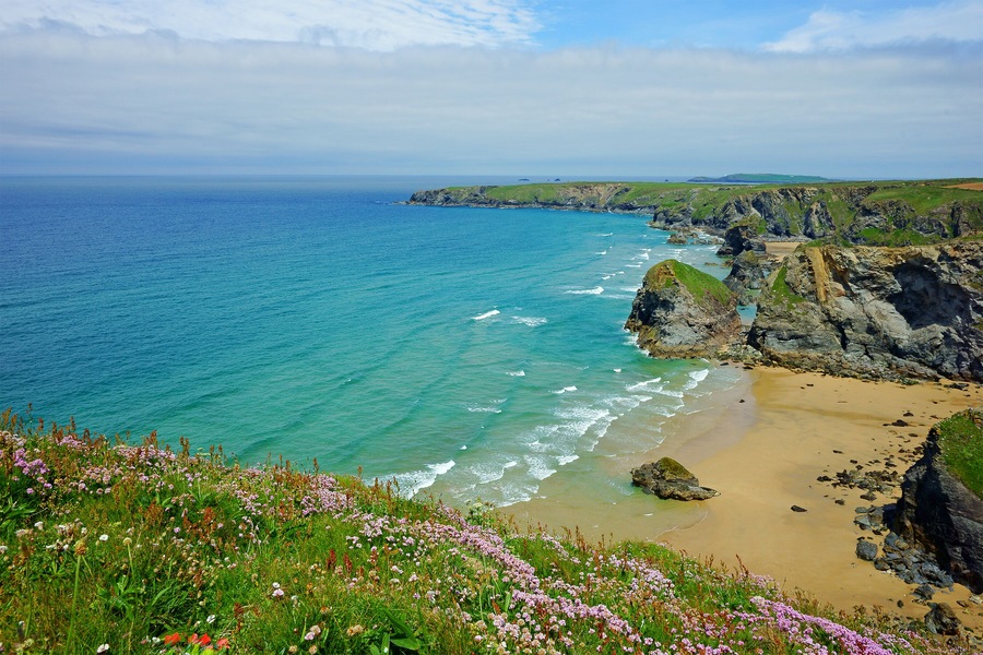 Panorama view of the stunning North Cornish coastline of Bedruthan Steps on a beautiful spring day, Cornwall, England, United Kingdom