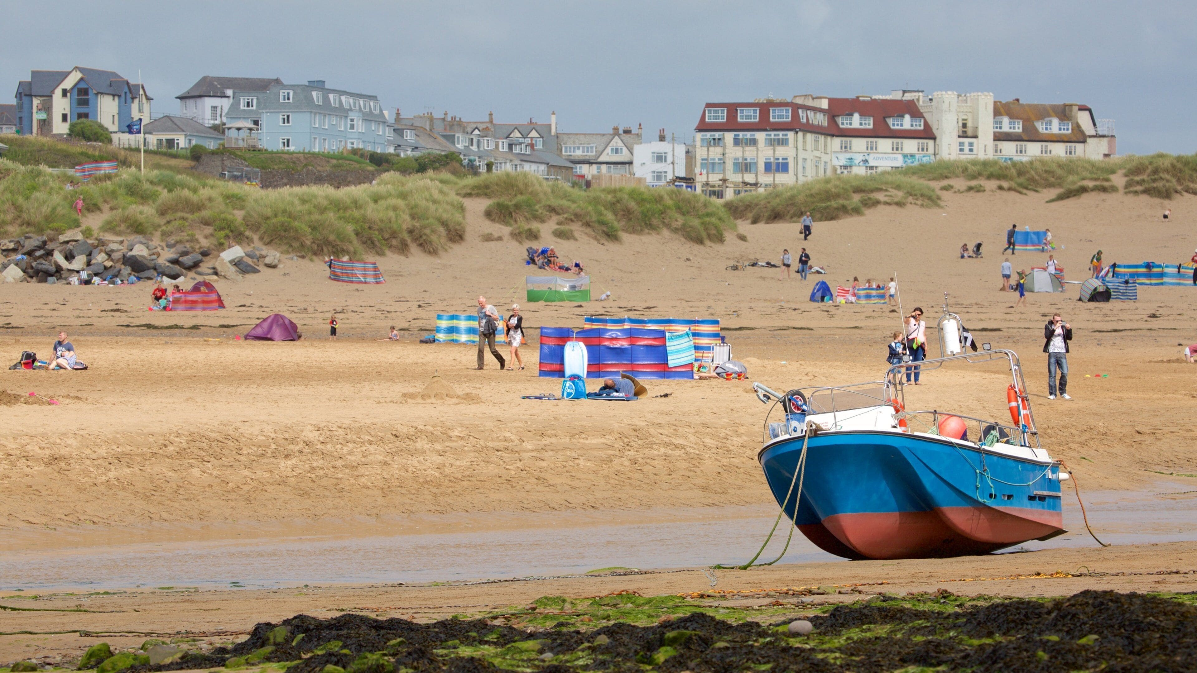 Bude Beach which includes boating, a coastal town and a beach